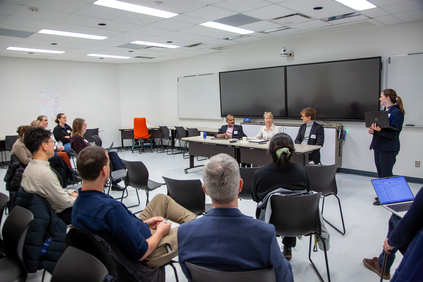 OVPRI Leaders actively listening to someone speak out of frame. From left to right, Muralee Murugesu, Martine Lagacé and Derrick Gibbings.