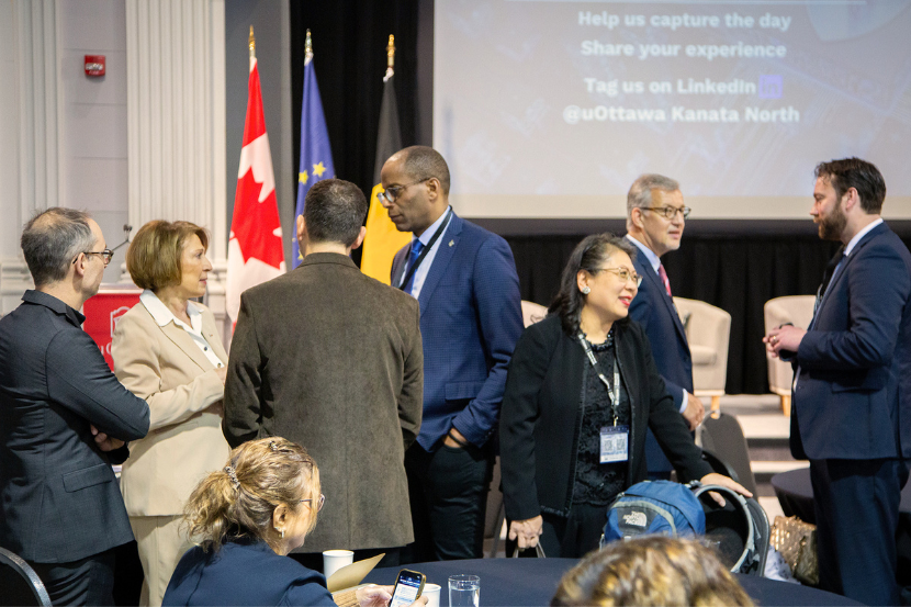 Panelists from across sectors network during the coffee break at the uOttawa National Security Innovation Forum.