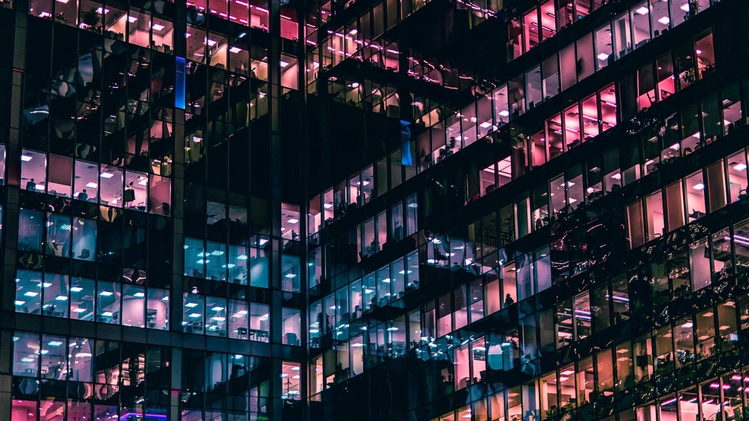 windows illuminated against a black background