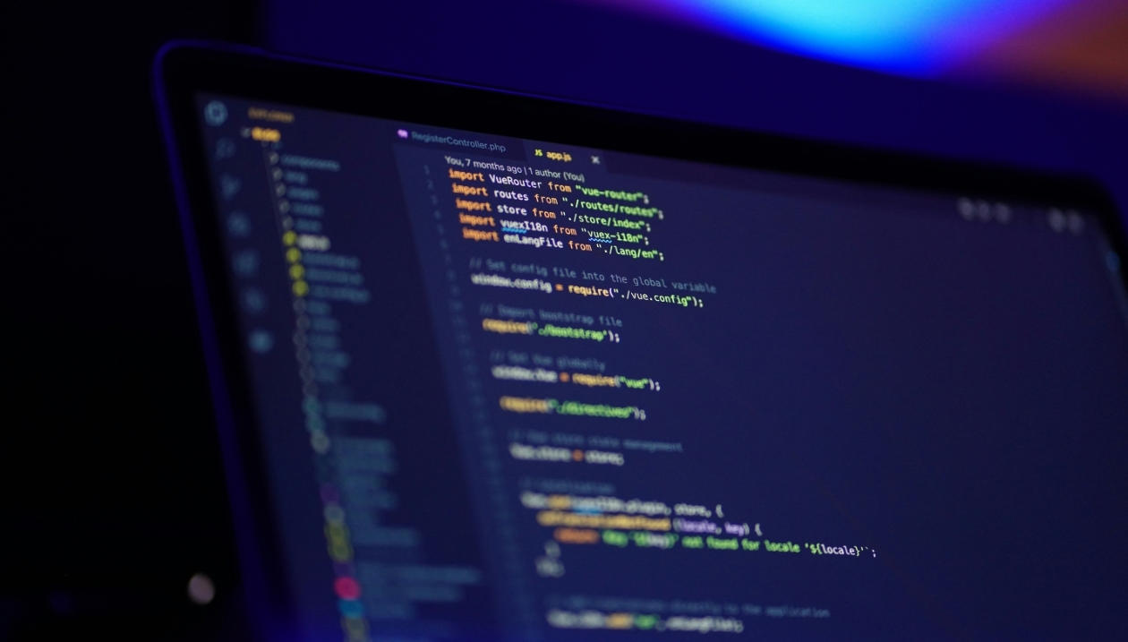 Computer with code displayed on the screen.