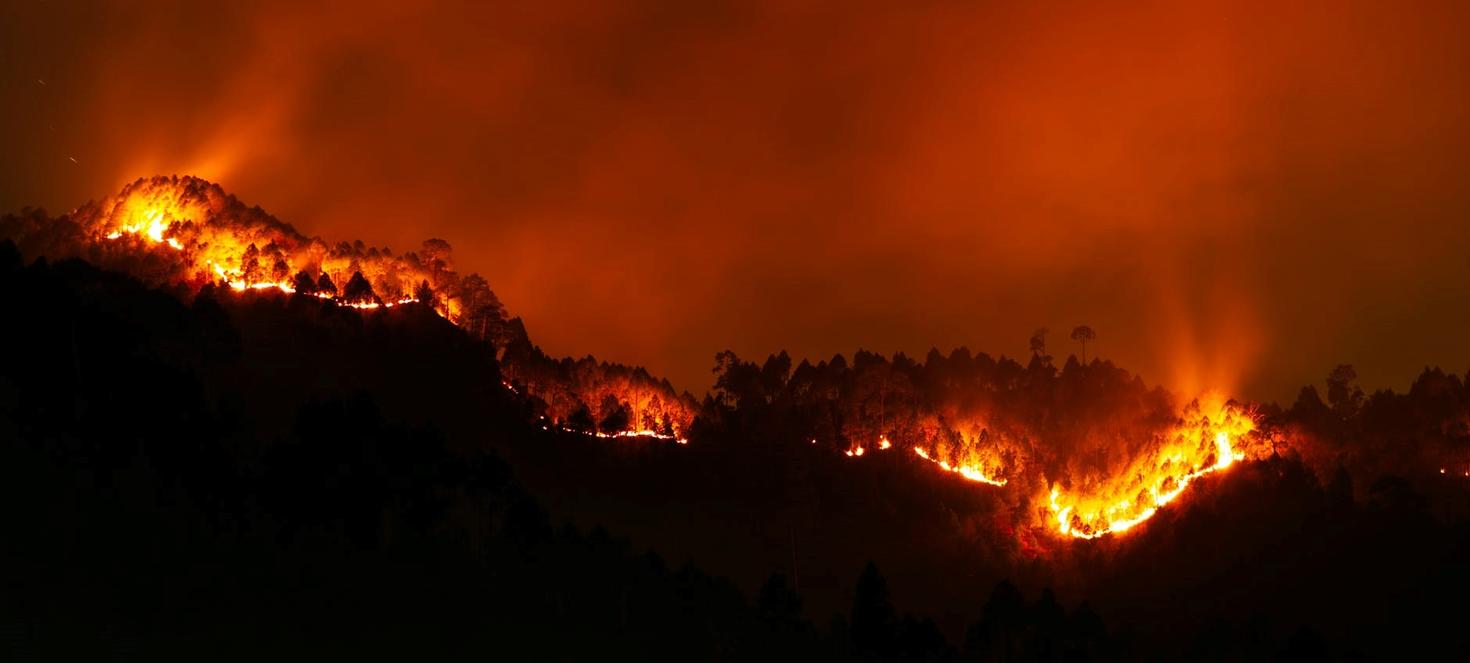 Wildfire rages at night