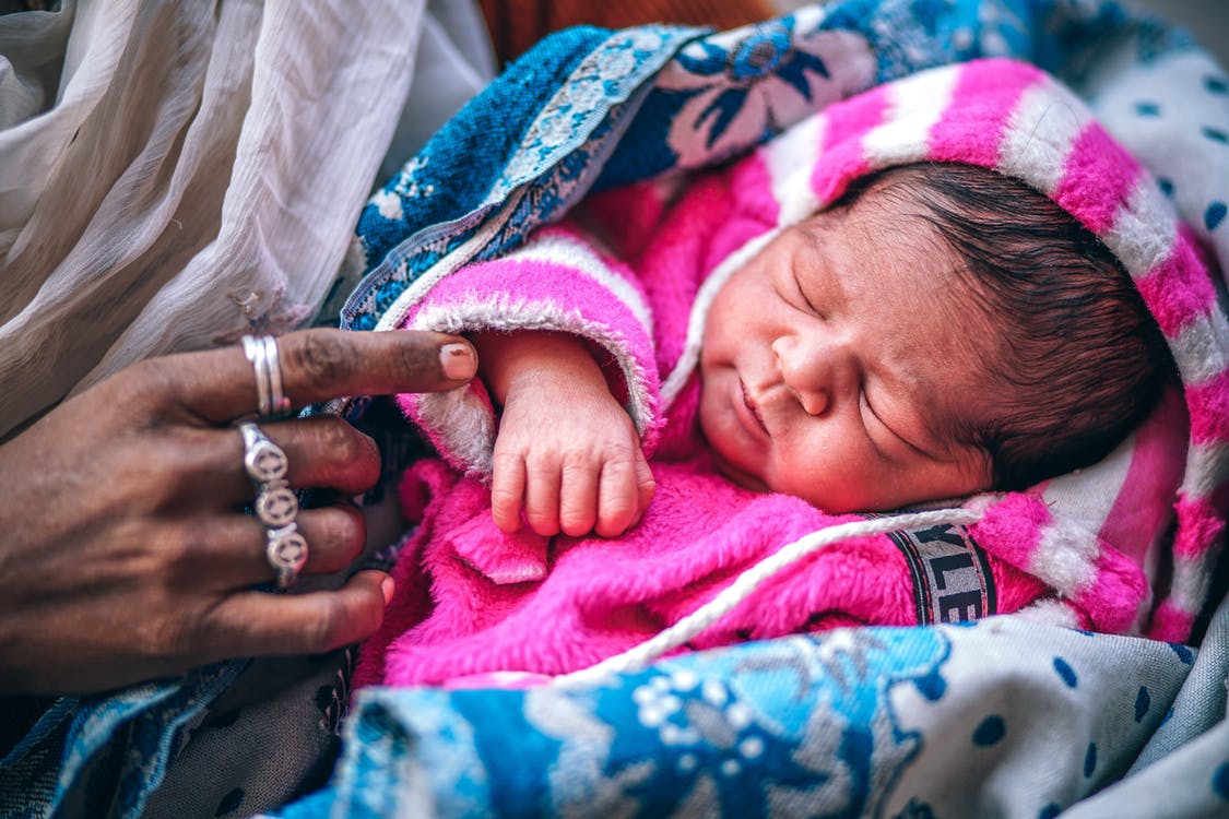 Newborn baby in blanket Newborn baby in a blanket