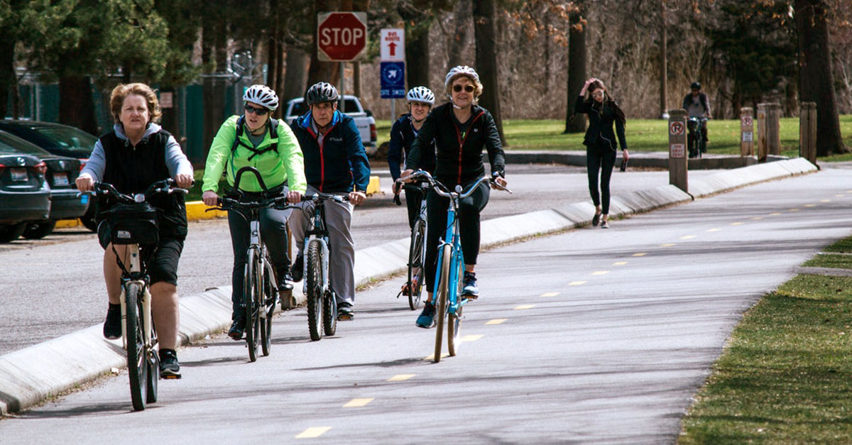 Adults commuting on bicycles