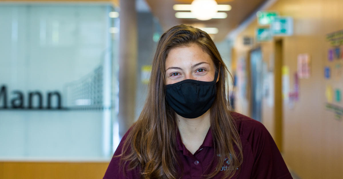 A person wearing a cloth non-medical mask