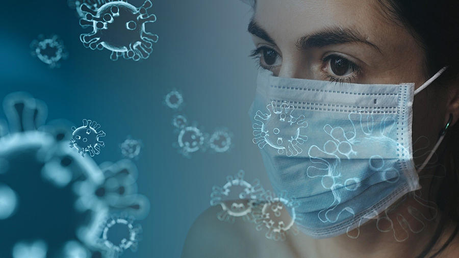 Femme portant un masque entourée d'une représentation de microbes