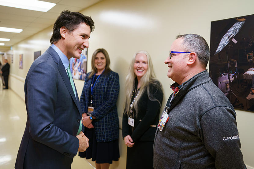 Prime Minister Justin Trudeau speaks to Dr. Glenn Posner.
