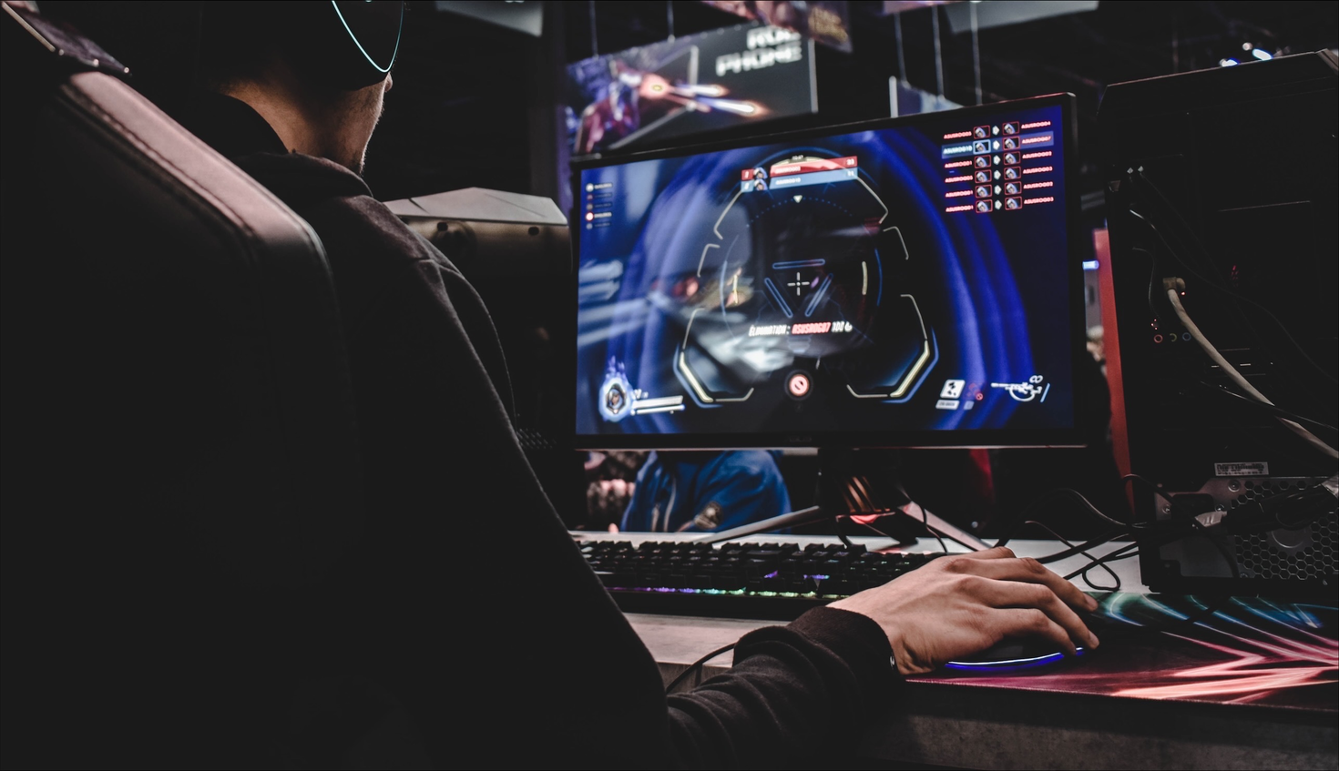 Gamer playing e-sports on computer.