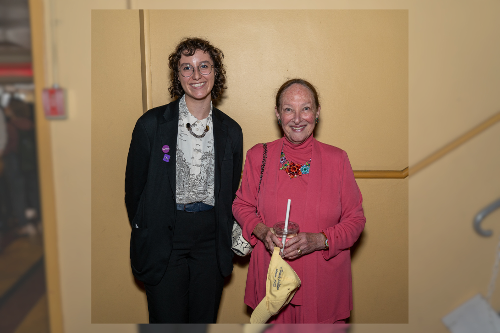 Clemence Thabet and Rosalie Abella standing in front of a yellow wall