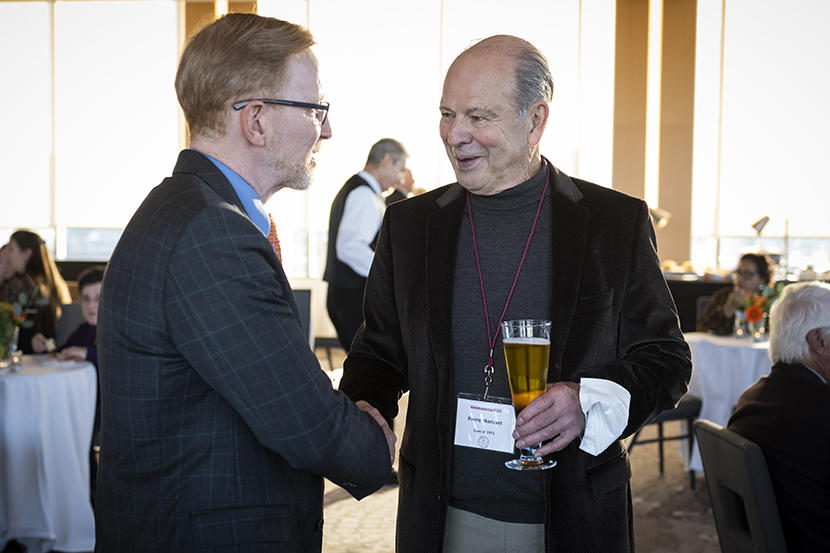 Dr. Morisset shaking the hand of Dr. Bernard Jasmin, dean of the Faculty of Medicine
