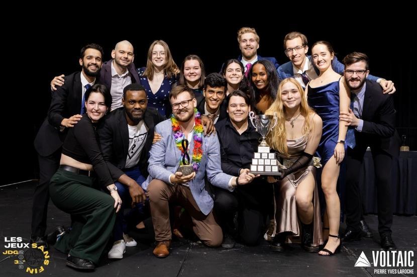 The joint uOttawa / Université du Québec en Outaouais delegation and their trophies.