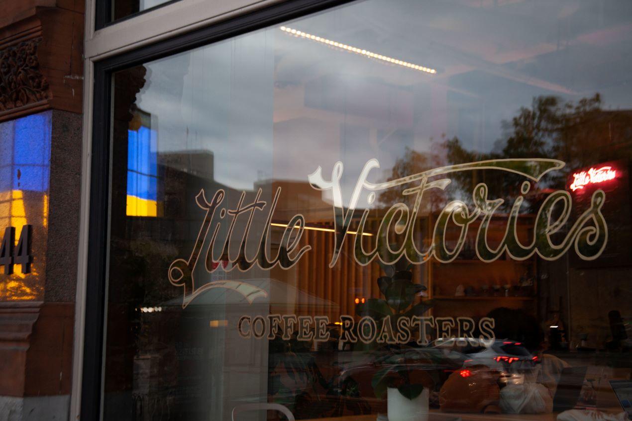 Little Victories café front window.