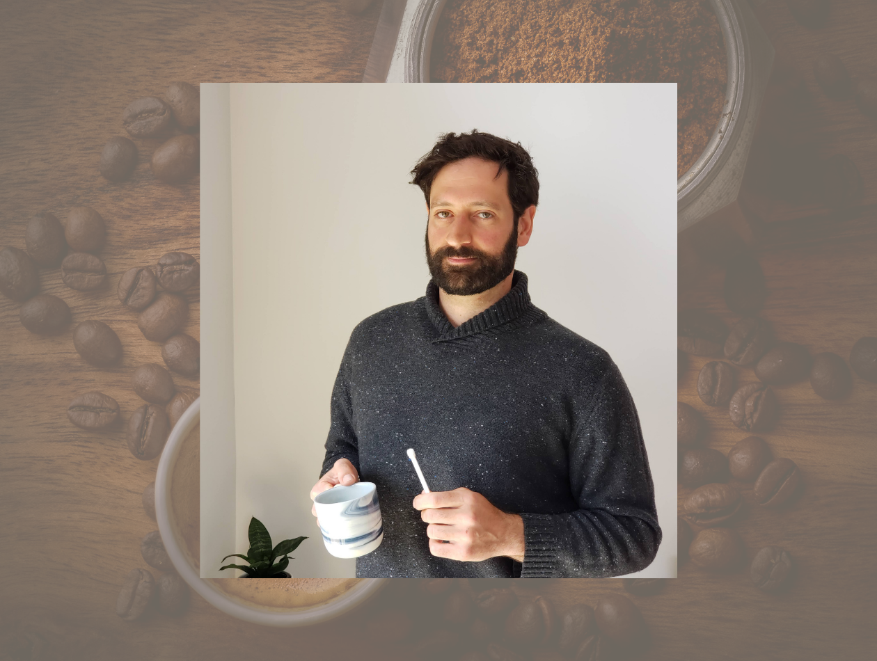 Harry Koundakjian holding an espresso cup