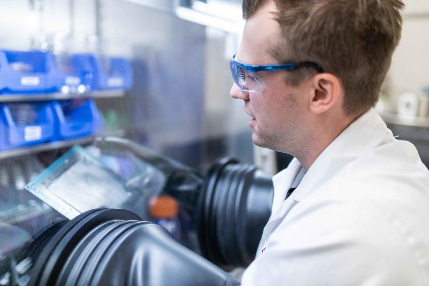 Professor Benoit Lessard working in the lab