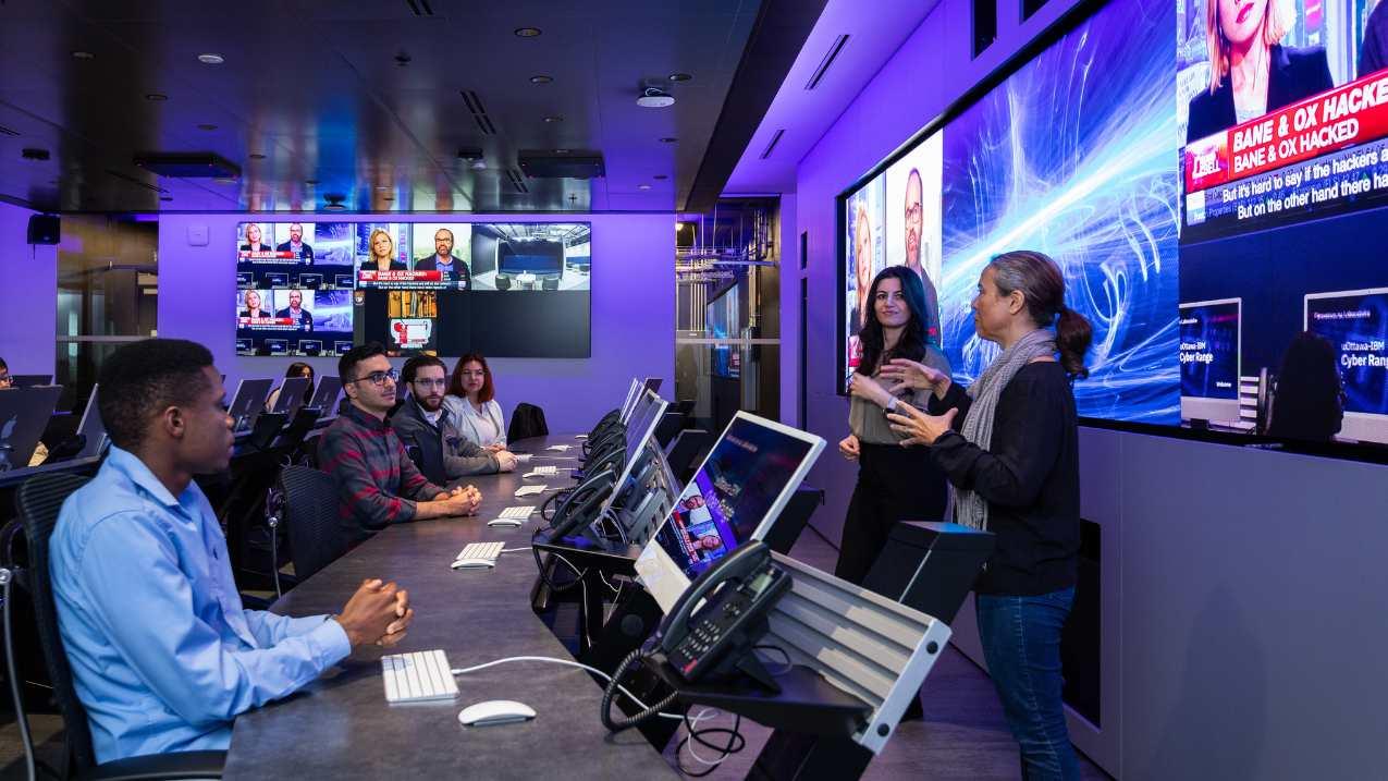 Group of people in the Cyber Range at uOttawa.