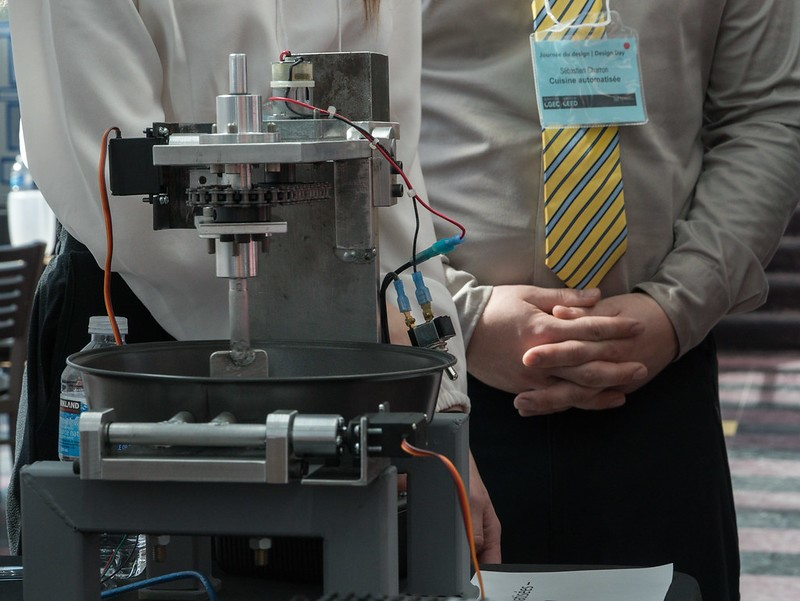 A prototype for a machine that cooks food automatically.