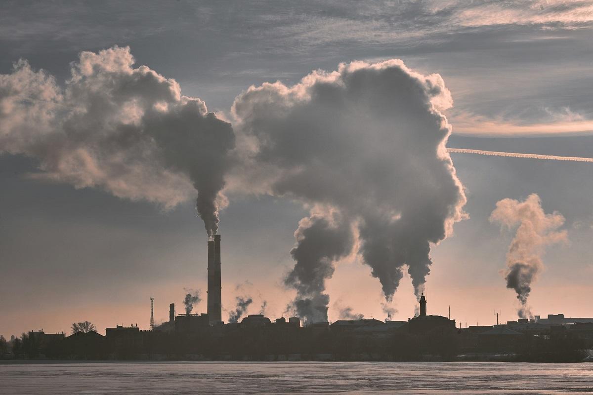 Smoke billowing from industrial chimneys