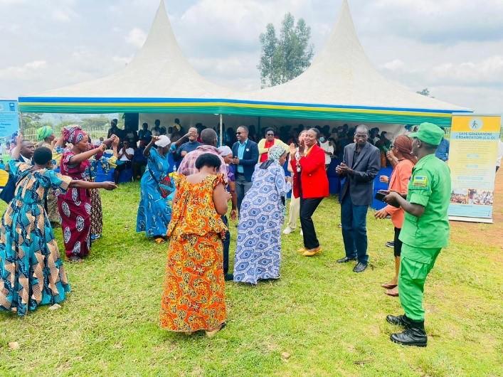 A group of women on a field dancing 