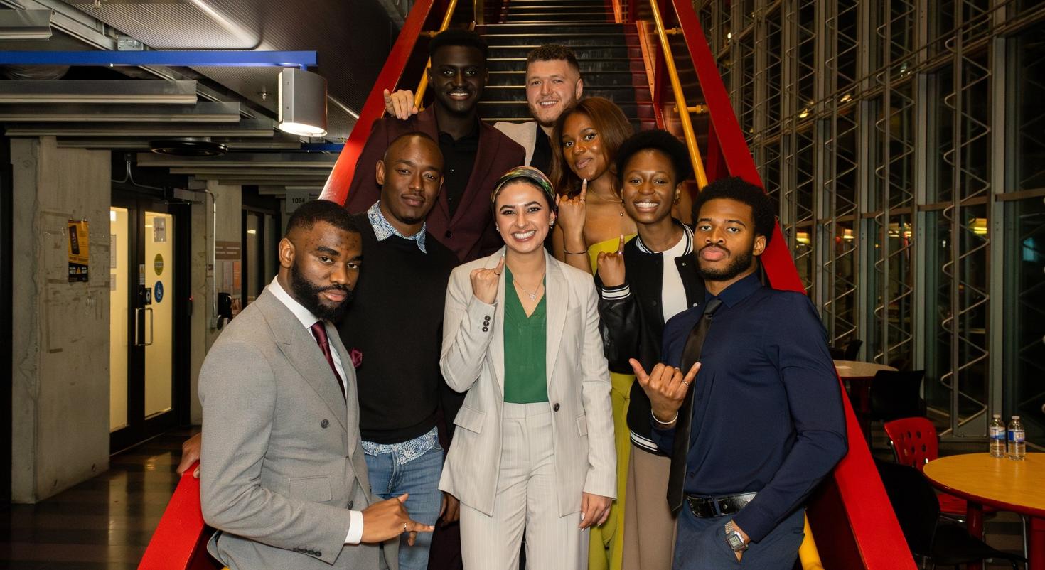 Graduating students showing their iron rings