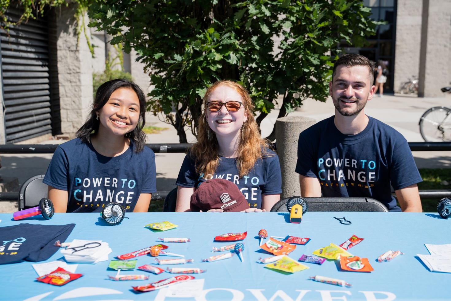 people smiling at a table 