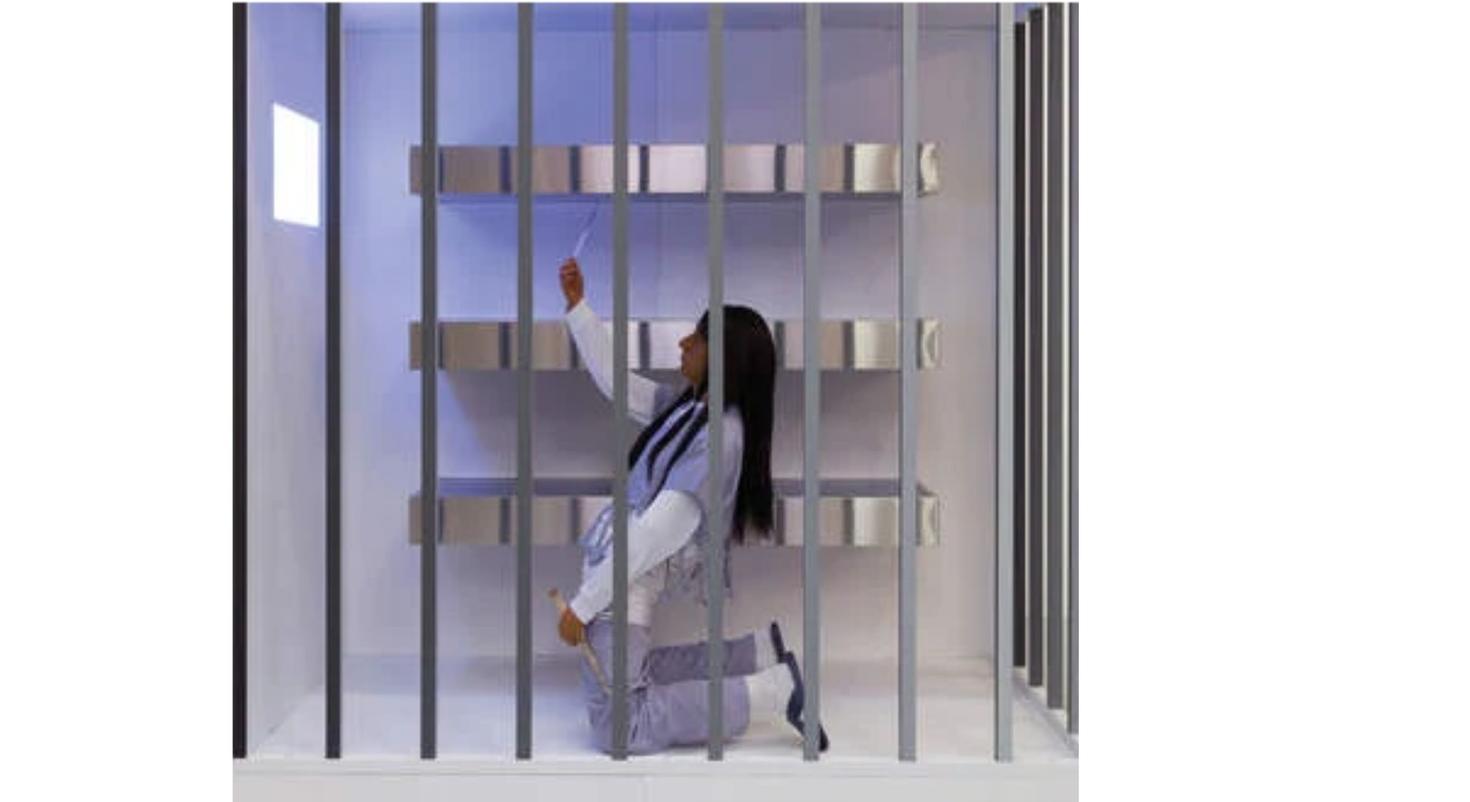 woman kneeling in a jail