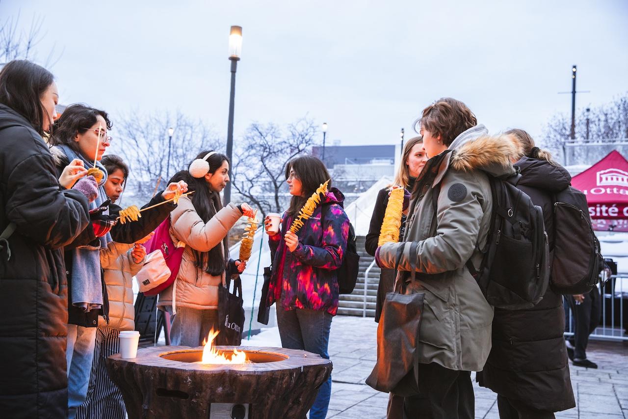 Students around bonfire