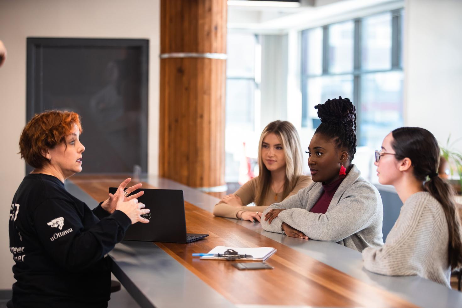 Four people around a table