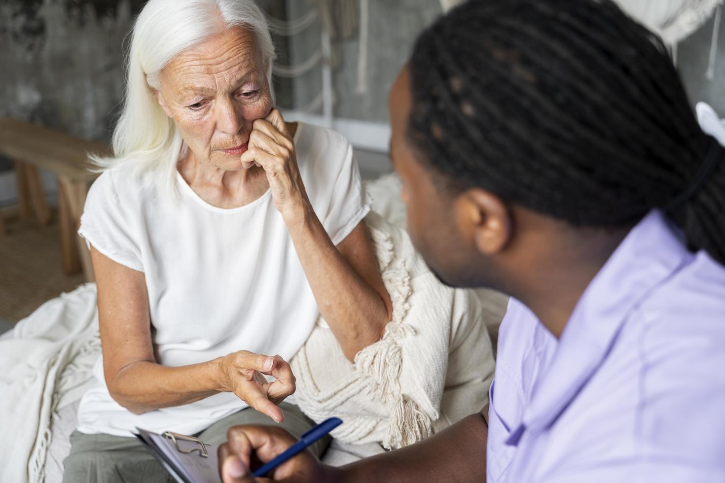 Health-care professional evaluating a patient