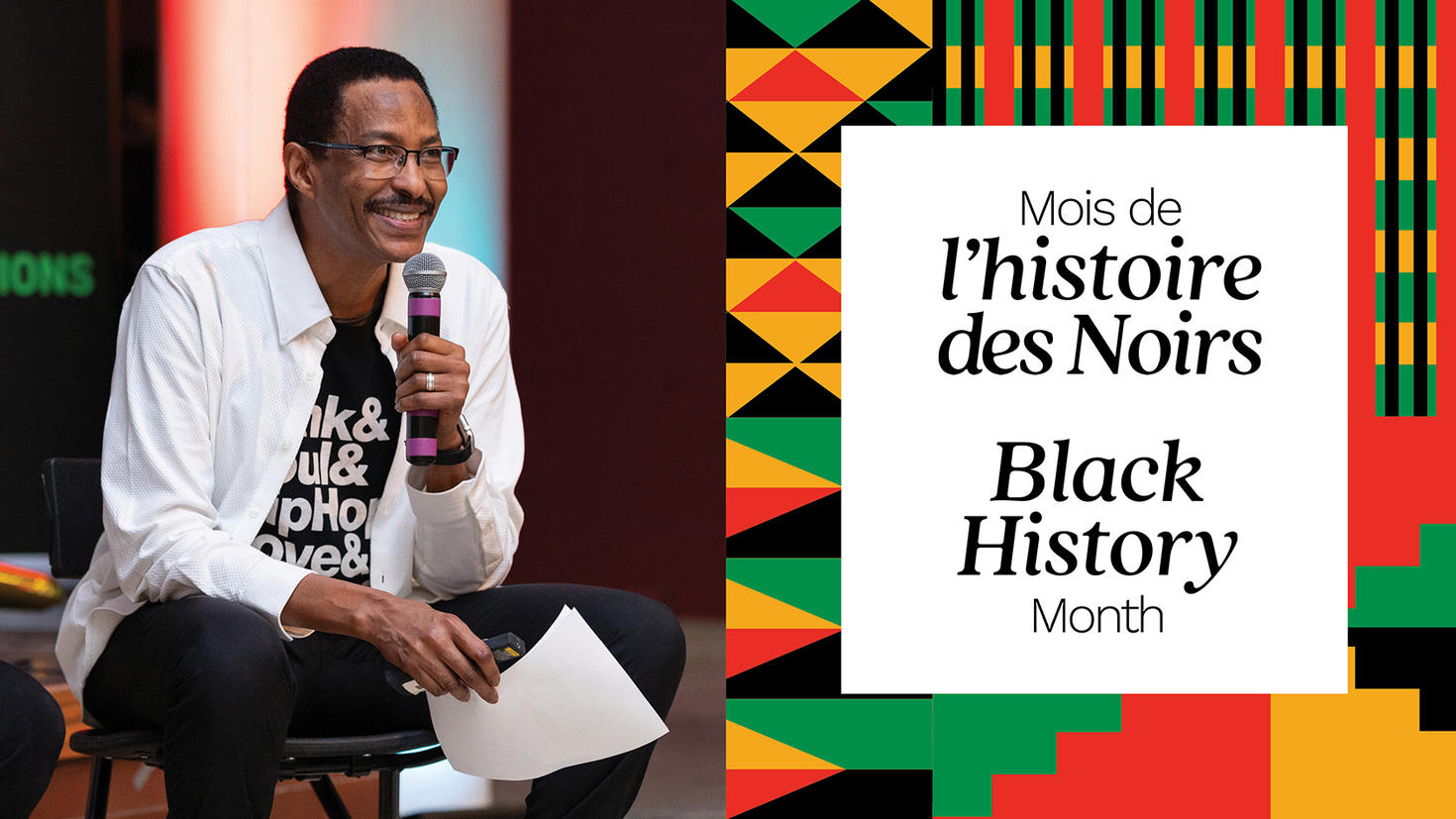 Awad Ibrahim, speaking into a microphone at an event, with a "Black History Month" graphic beside him.