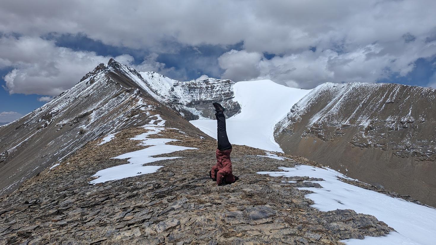 Myra Beaudoin Bertrand practicing yoga in the mountains