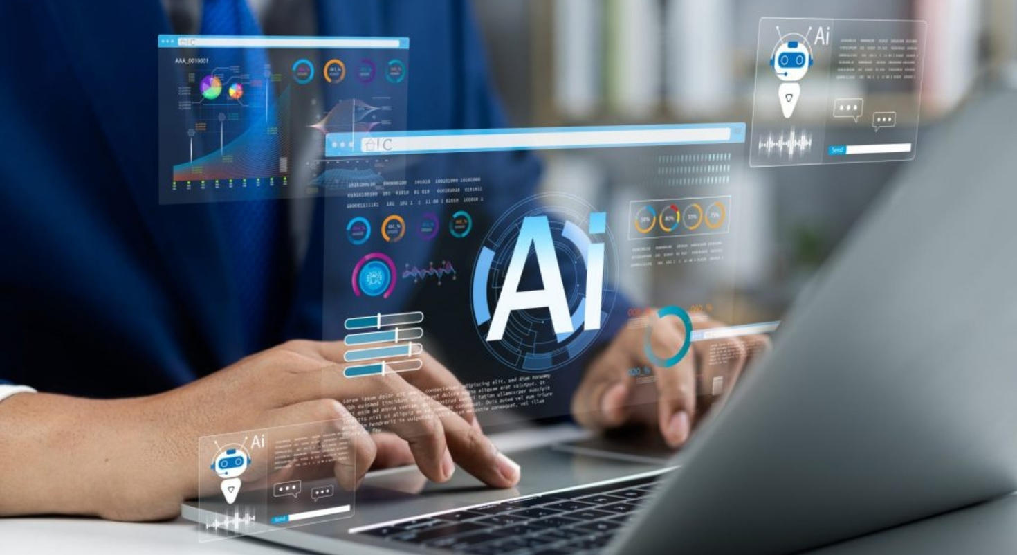 Une personne en train de taper à l'ordinateur derrière un hologramme d'intelligence artificielle.
