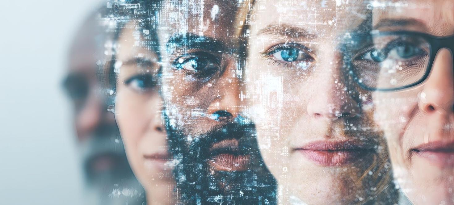 Row of faces from different background, ages, etc. 