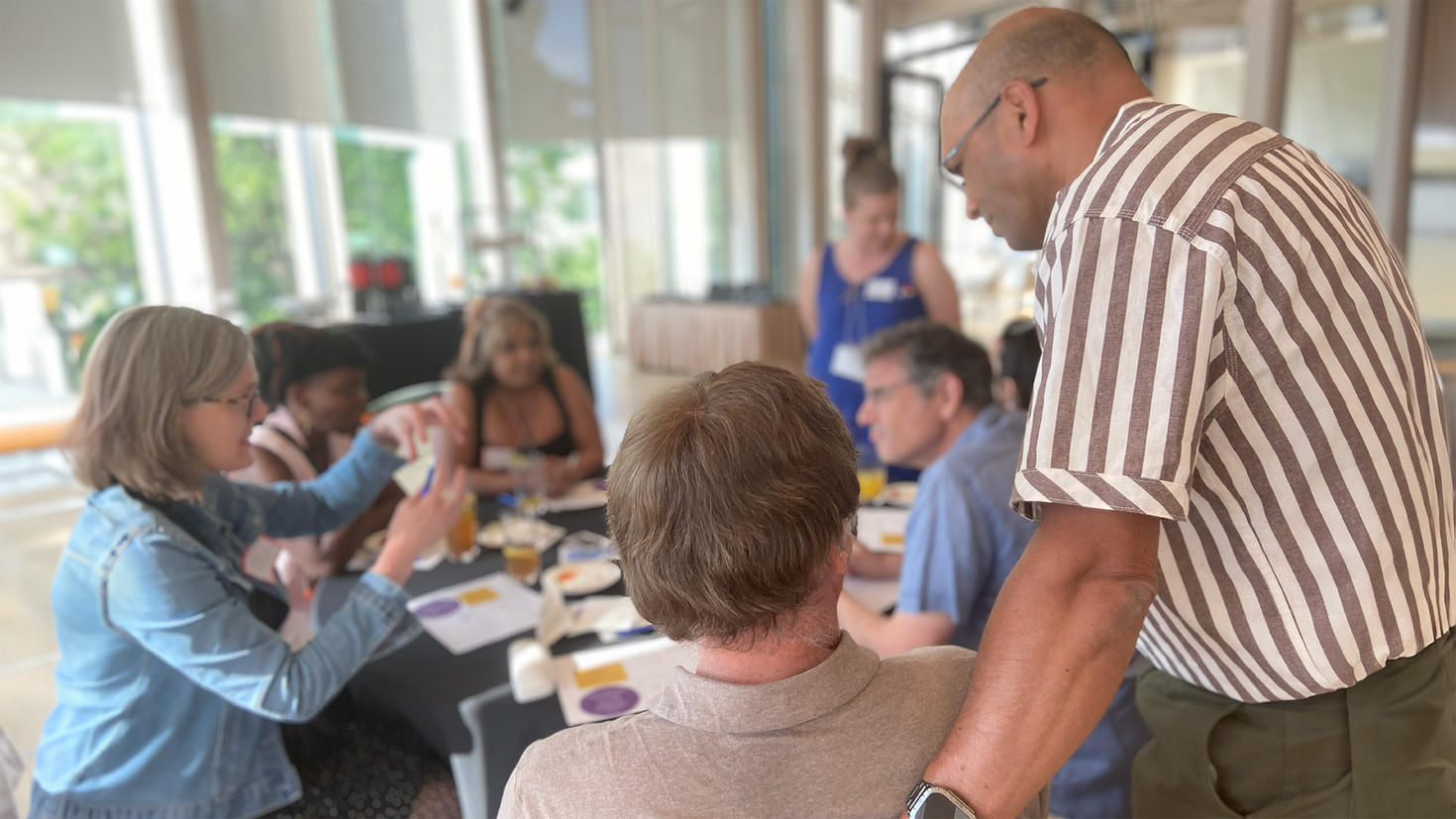Teachers engaged in a round table discussion. 