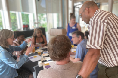 Teachers engaged in a round table discussion. 