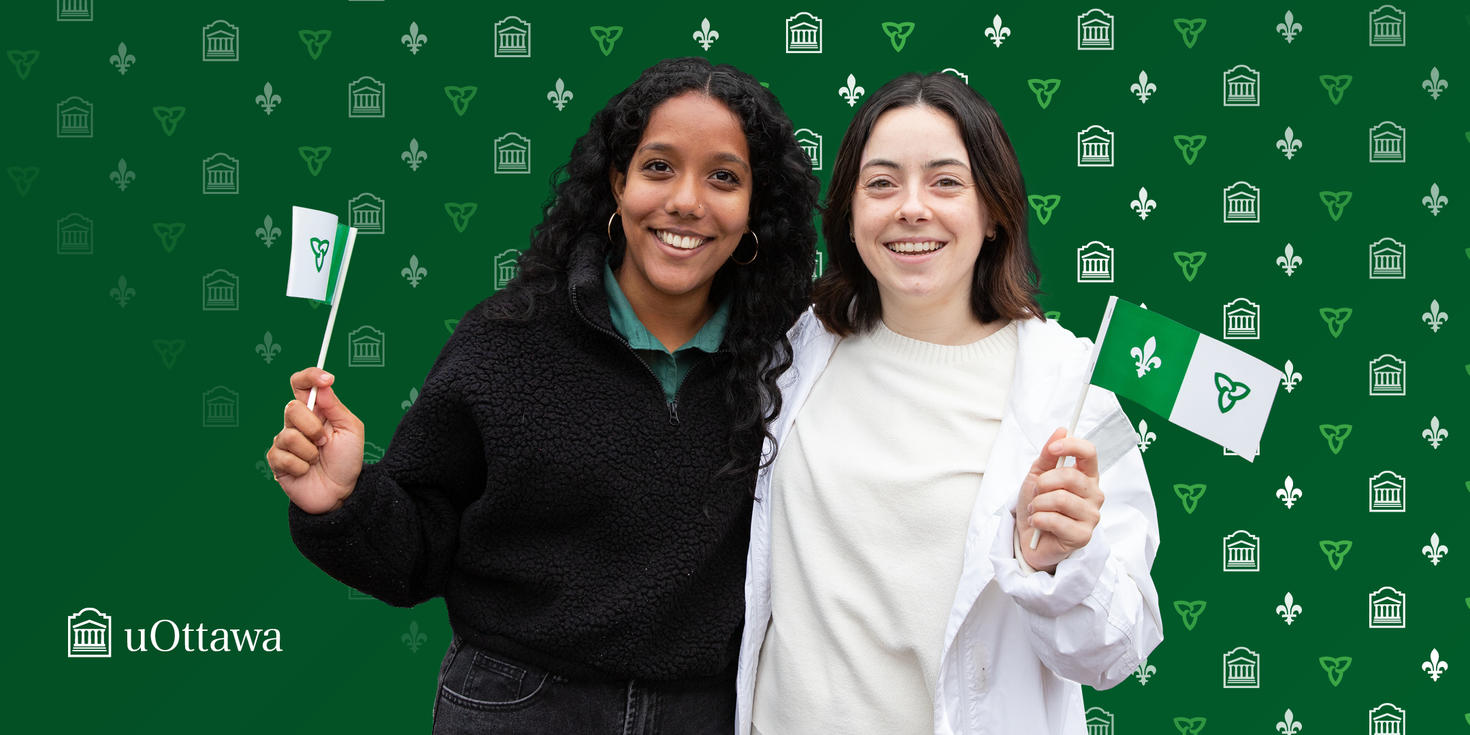 2 persons holding the franco-ontarian flag in their hands