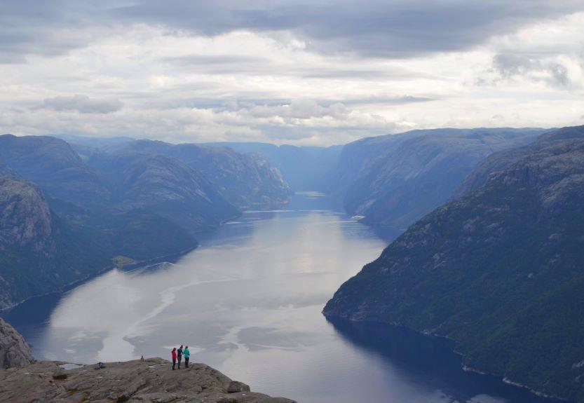 A stunning vista of a wide river between fjords in Norway.