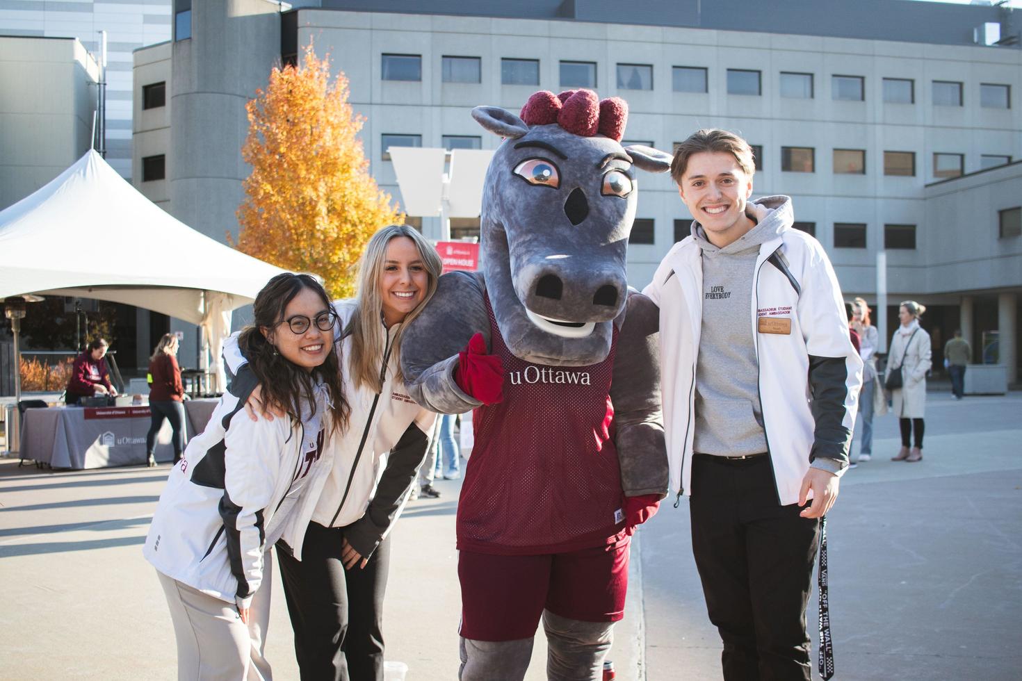 Student ambassadors with the Gee-Gees mascot