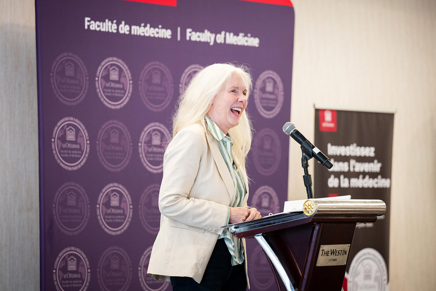 Dr. Melissa Forgie speaking to alumni during the brunch.