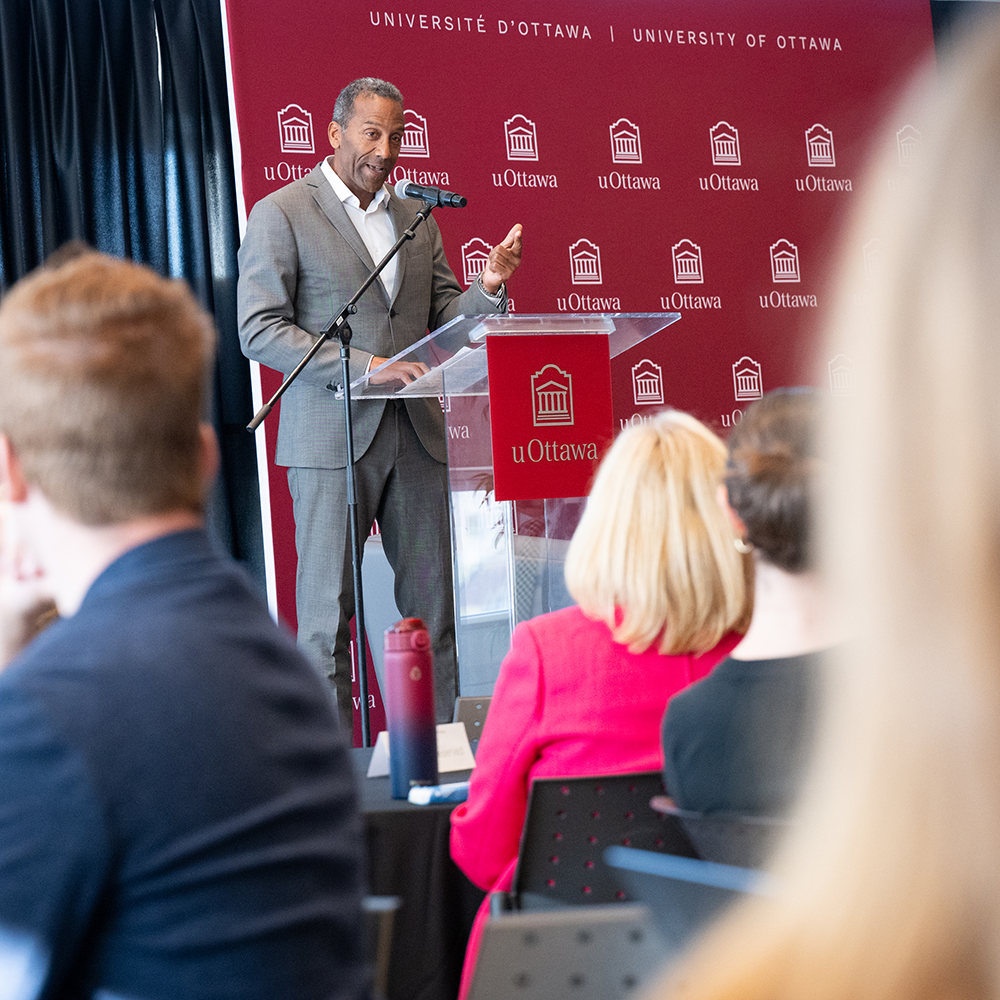 Dean of the Tefler School of Management speaking to students