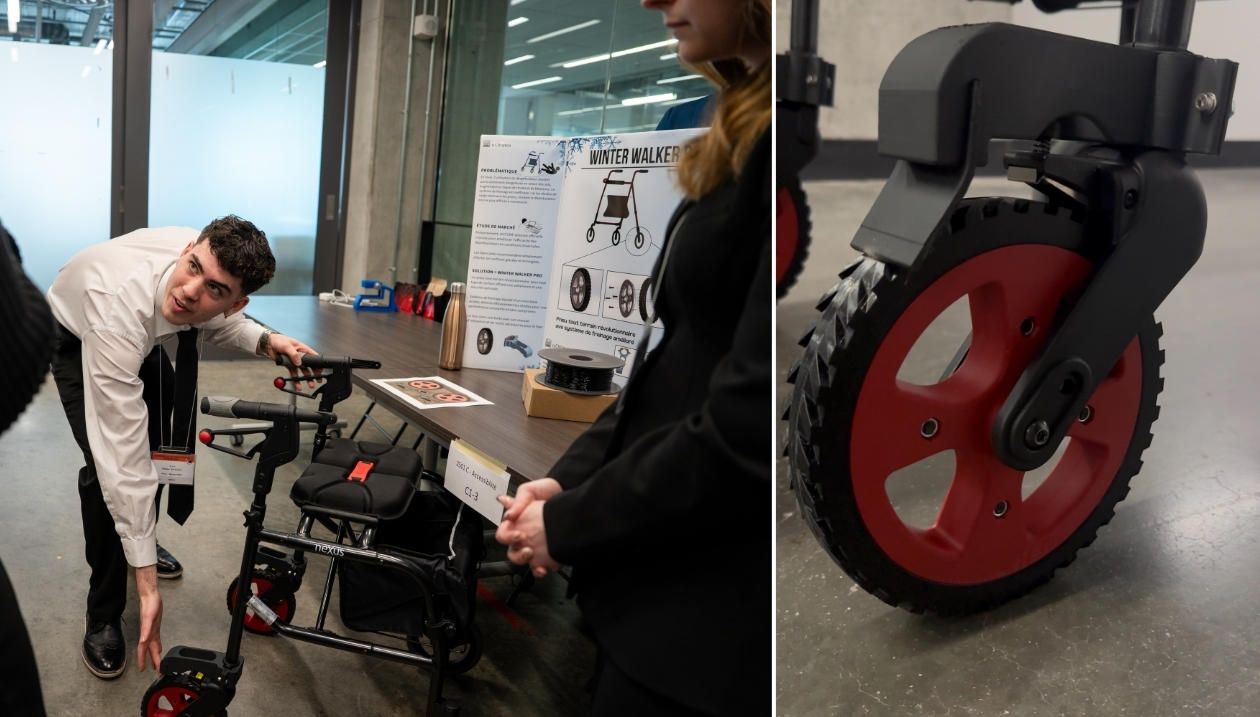 Student presenting a red and black wheel from the winter walker prototype.