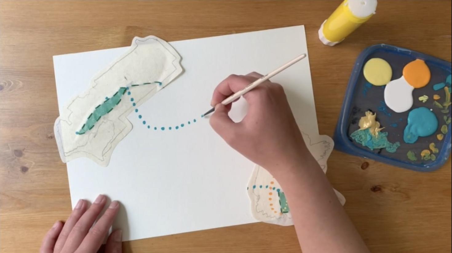 Hand painting during art workshop