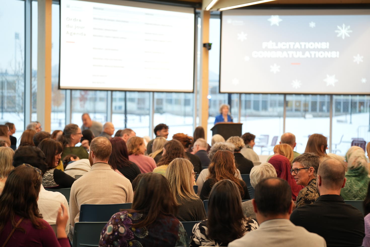 Photo of people listening to FHS Dean's Lucie Thibault