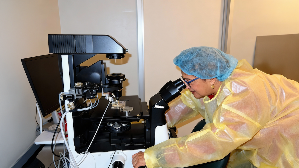 Dr. Sangita Jindal during a meticulous laboratory analysis session