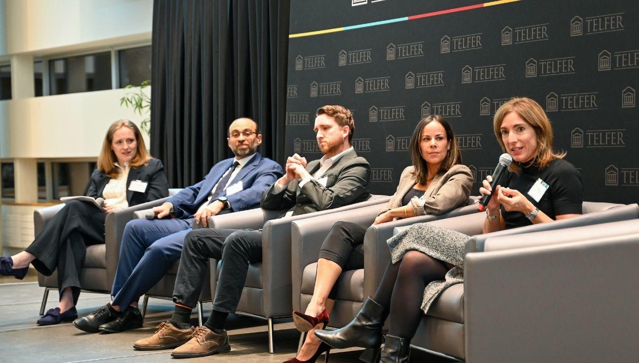 Five panelists seated on stage discuss community-based primary care at the Telfer Health System Conversation.