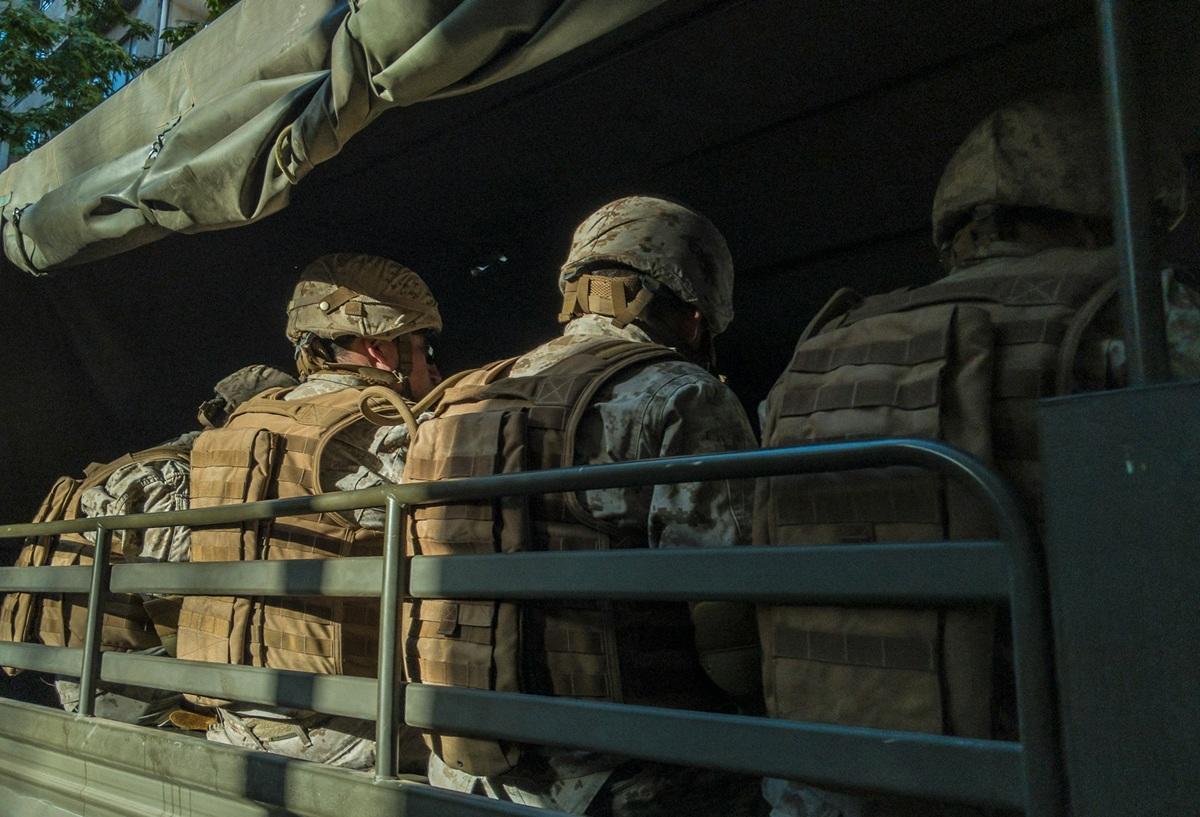 U.S. military members on a truck
