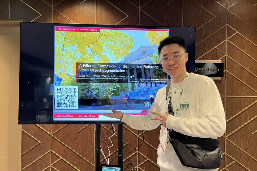 Xiao Hu with his presentation.