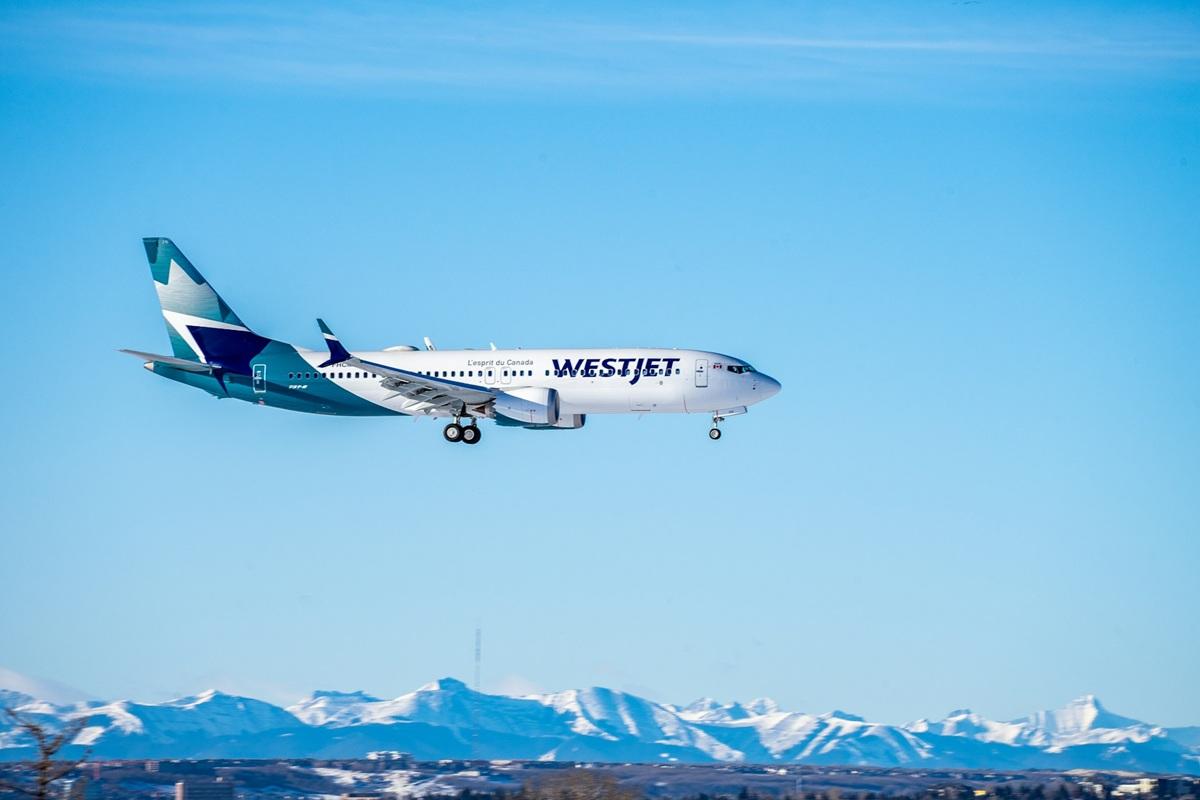 WestJet plane in the sky