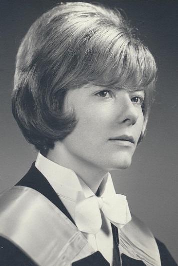 Monique Frize in graduate's gown.