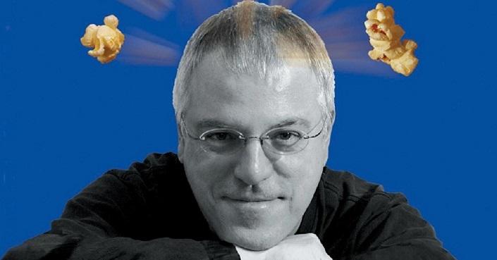 Une photo de Robert Fontaine; du maïs soufflé jaillit de sa tête.